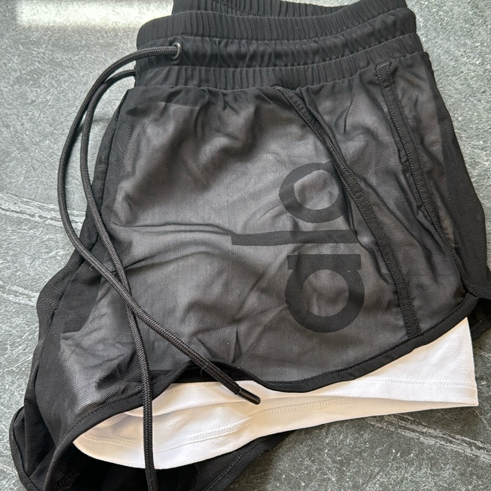 Alo ambiance short, black mesh with white spandex underneath, size S